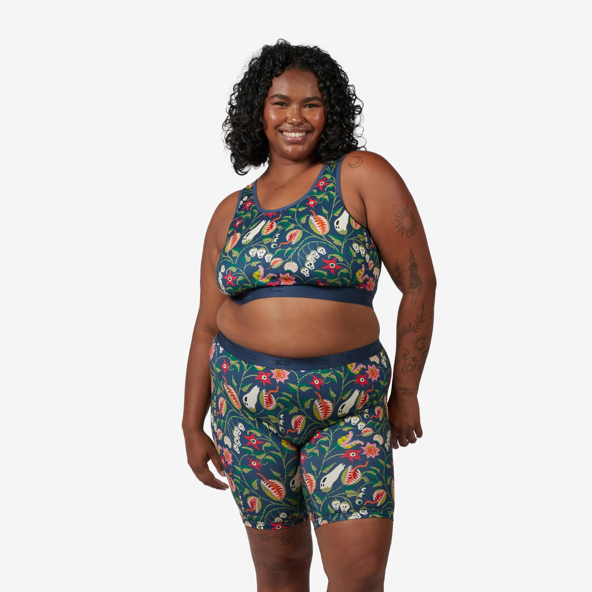 Model: Maliyah is 5'7" and wears a 2X