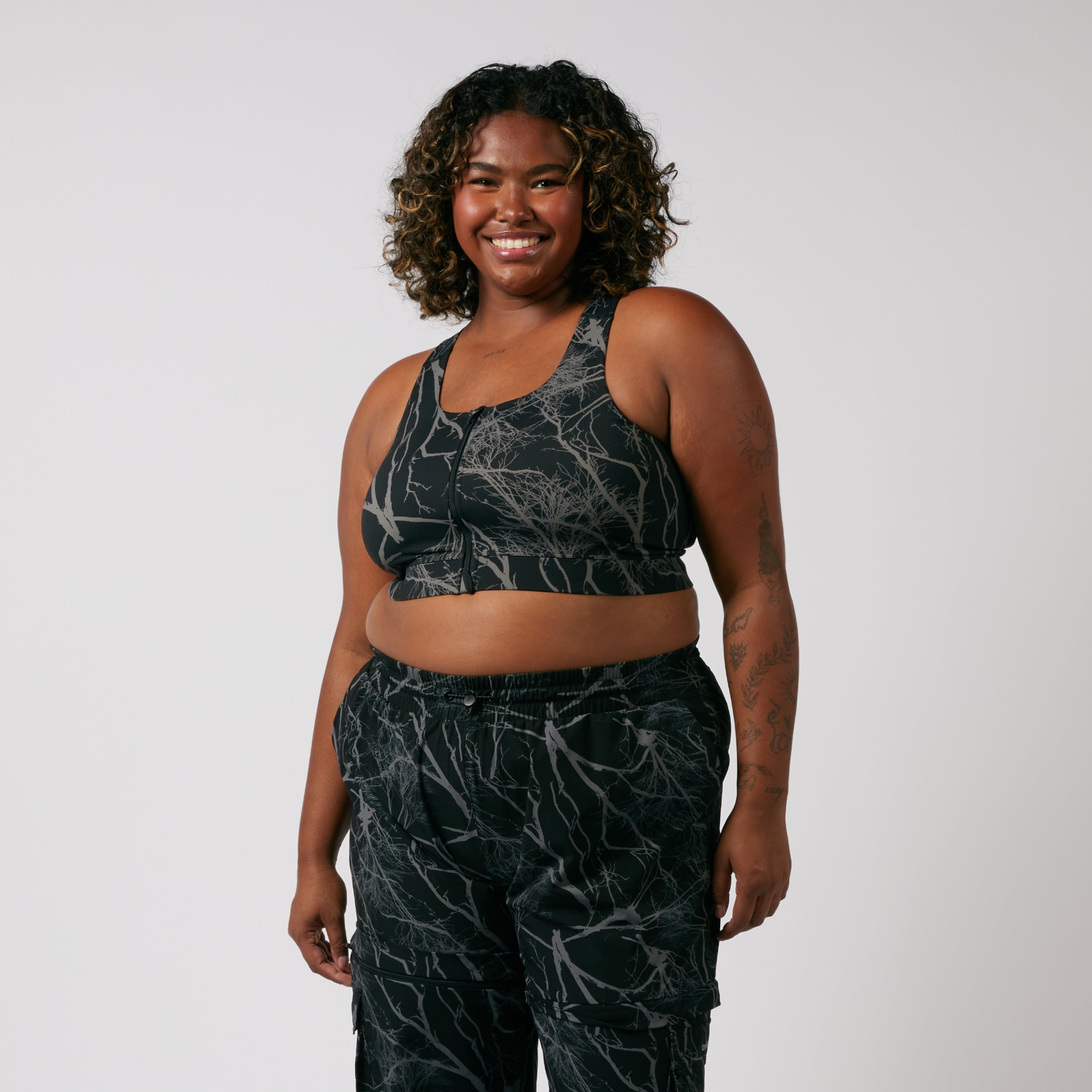 Model: Maliyah is 5'7" and wears a 2X