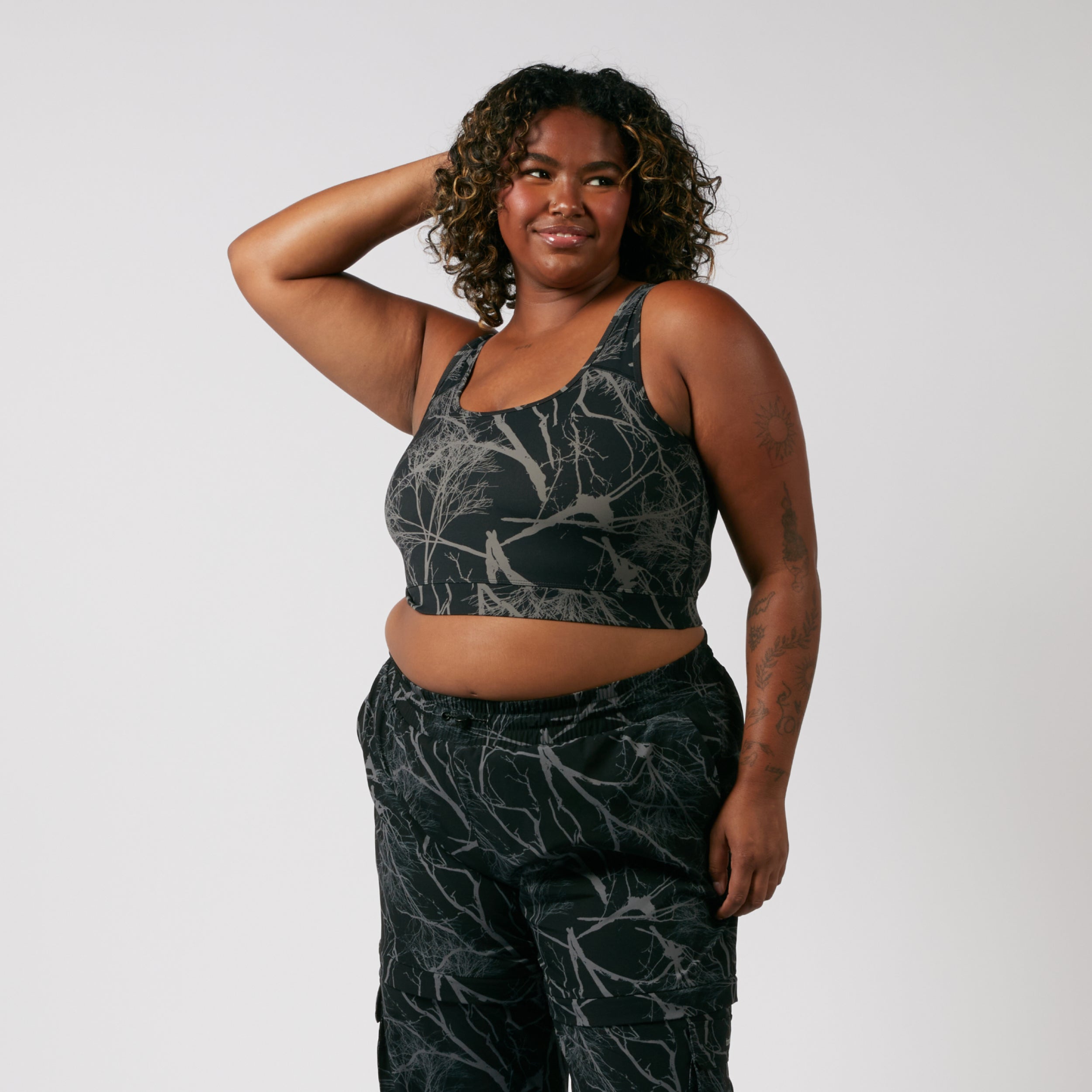 Model: Maliyah is 5'7" and wears a 2X