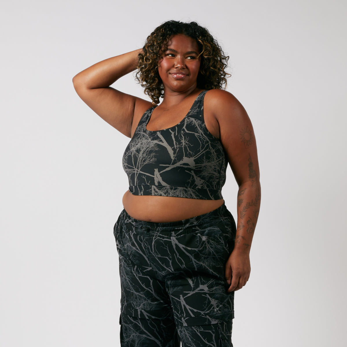 Model: Maliyah is 5'7" and wears a 2X
