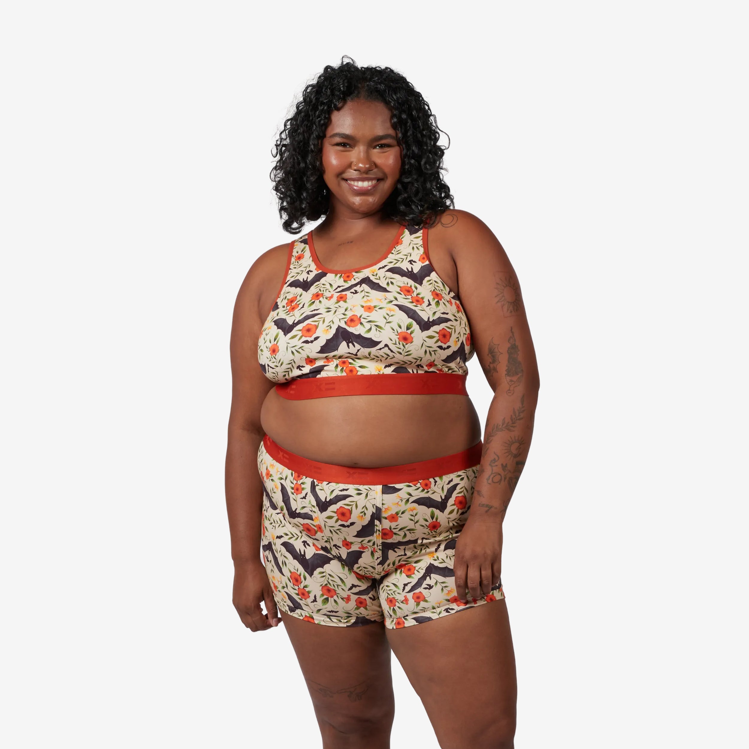 Model: Maliyah is 5'7" and wears a 2X