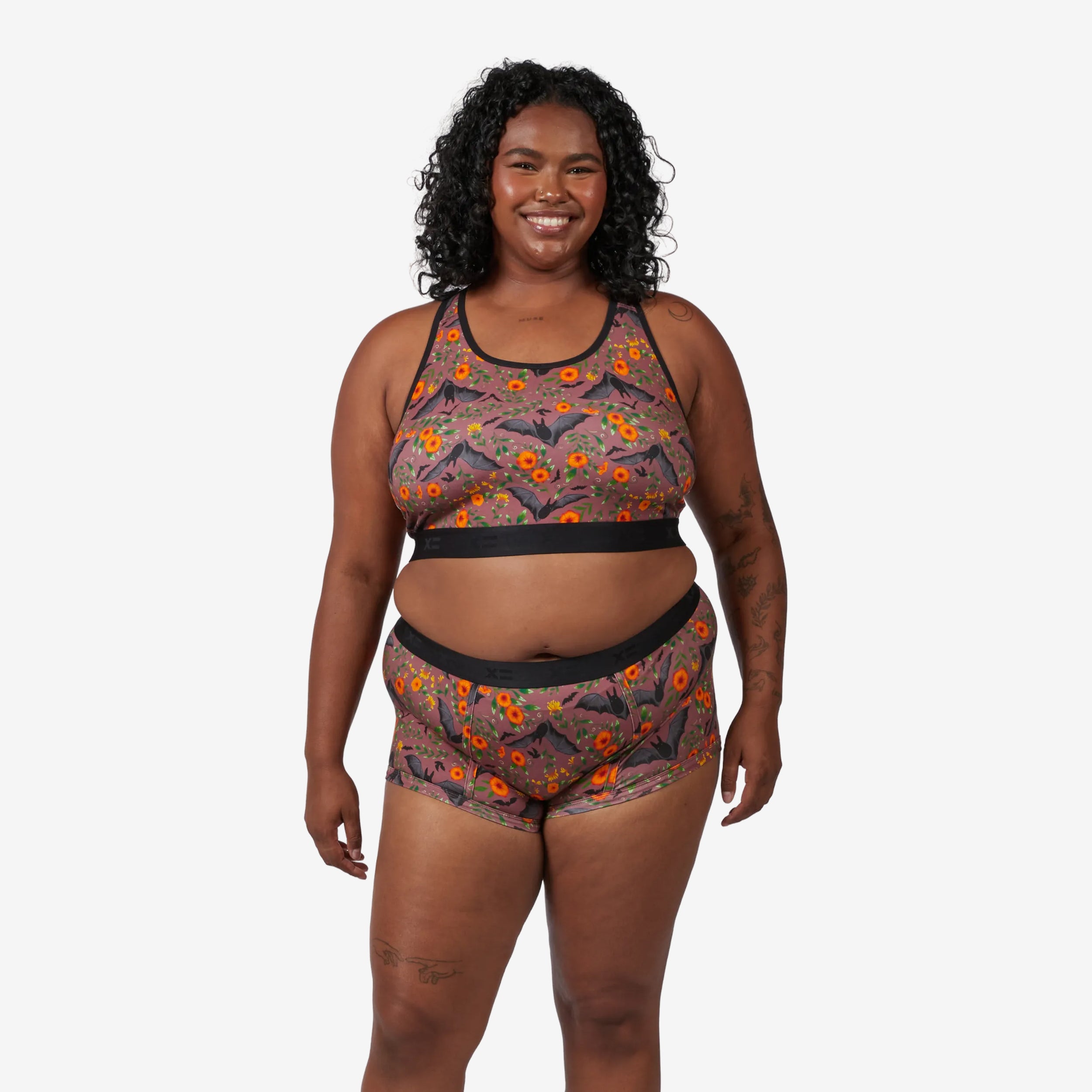 Model: Maliyah is 5'7" and wears a 2X