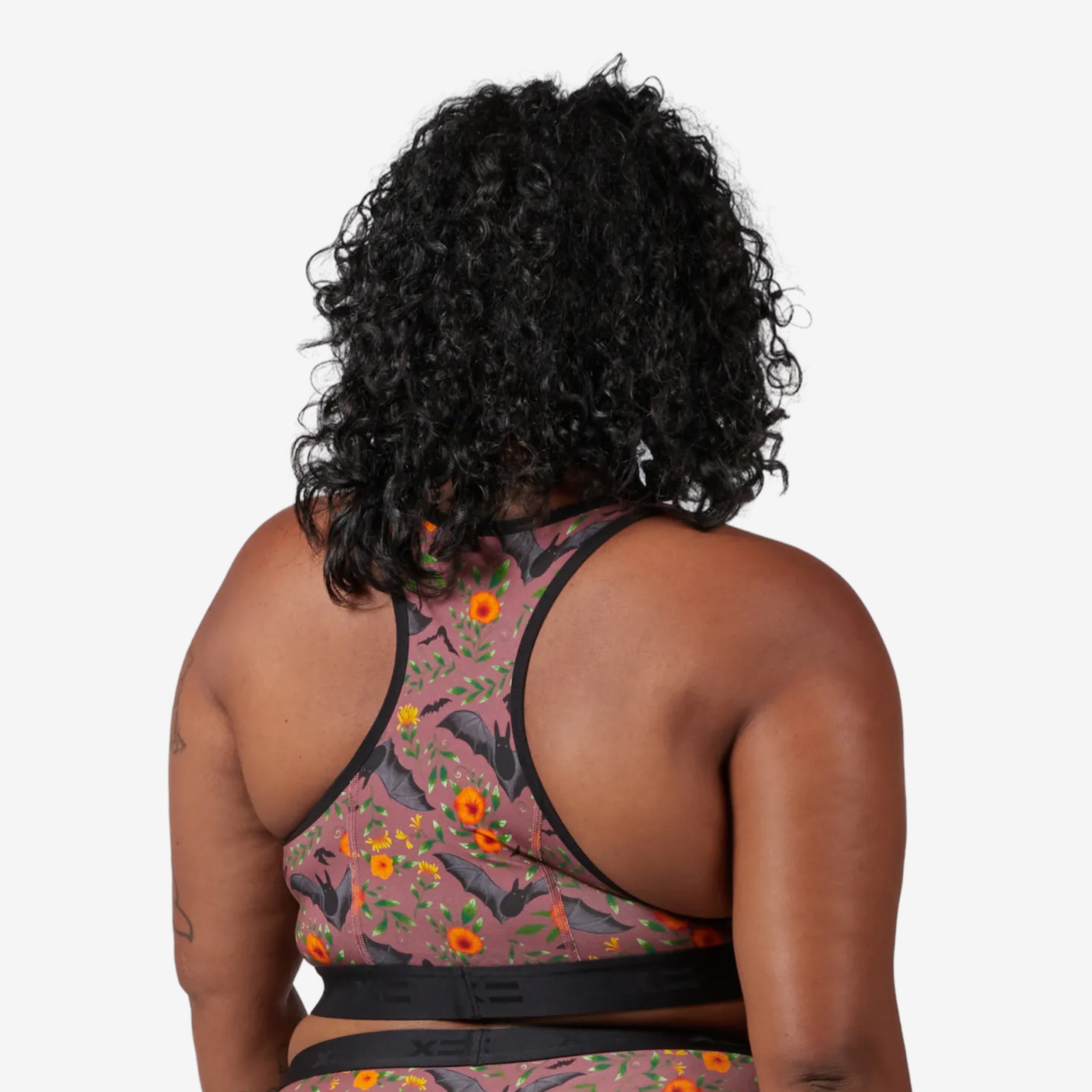 Model: Maliyah is 5'7" and wears a 2X