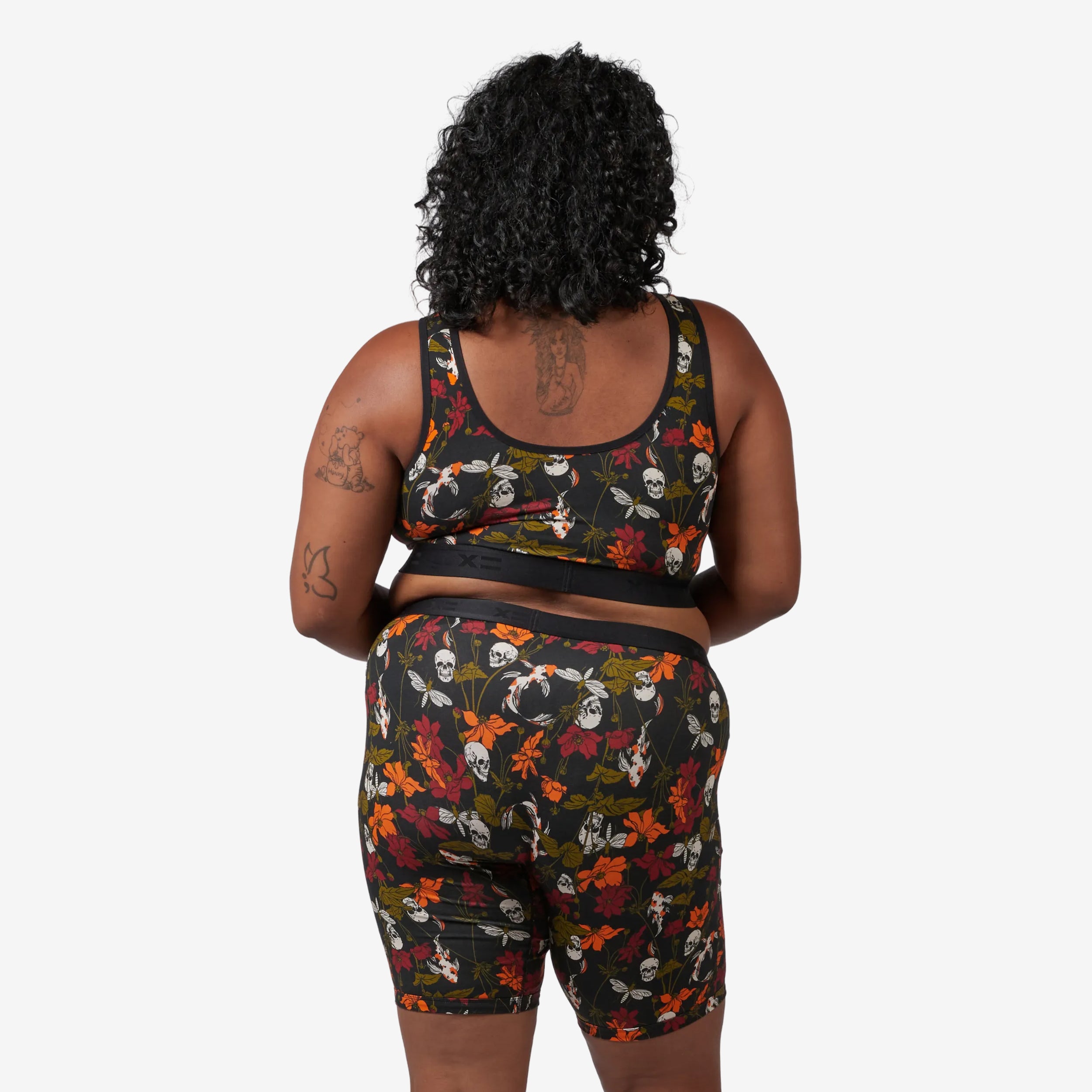 Model: Maliyah is 5'7" and wears a 2X
