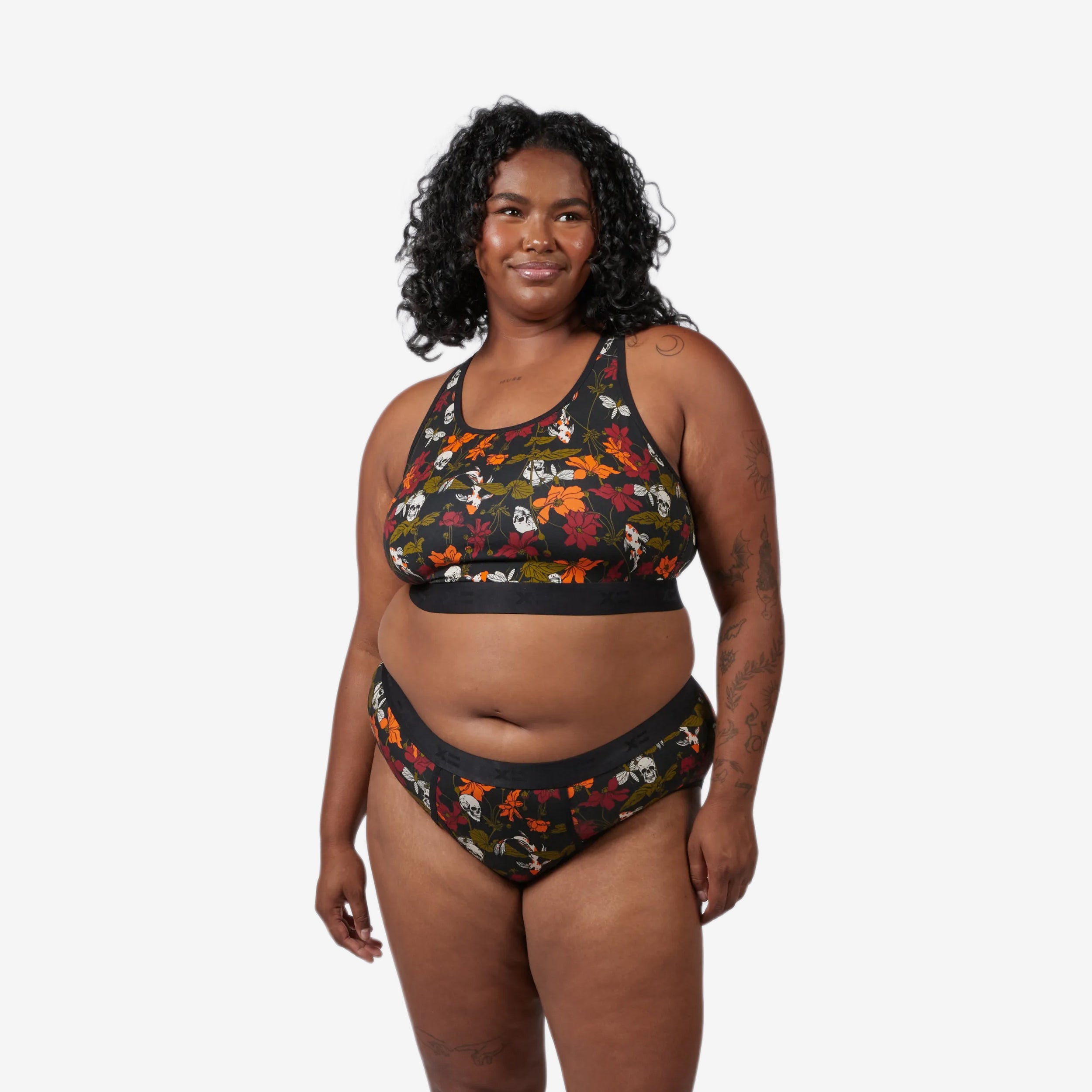 Model: Maliyah is 5'7" and wears a 2X