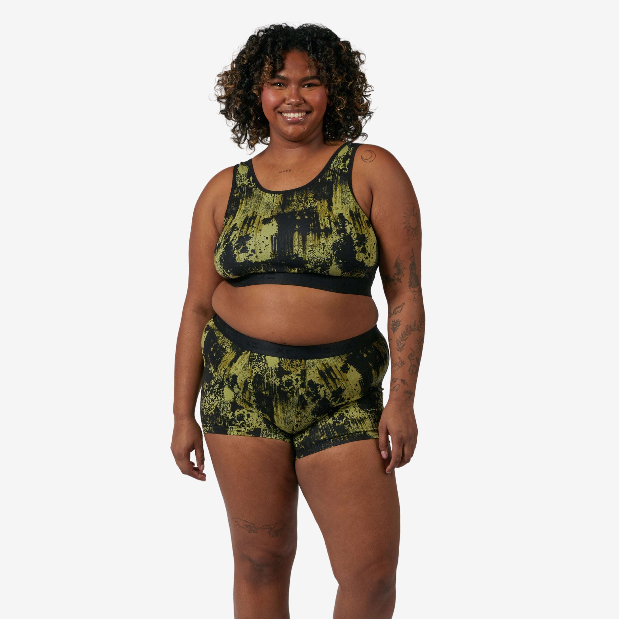 Model: Maliyah is 5'7" and wears a 2X