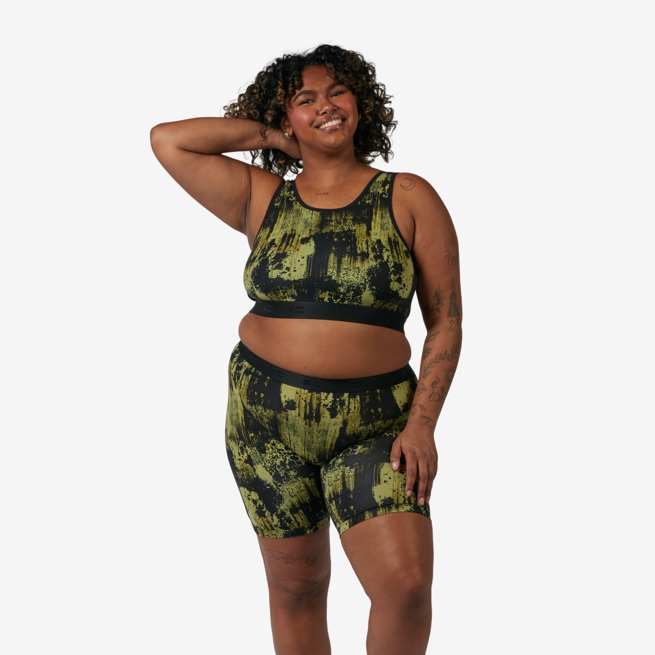 Model: Maliyah is 5'7" and wears a 2X