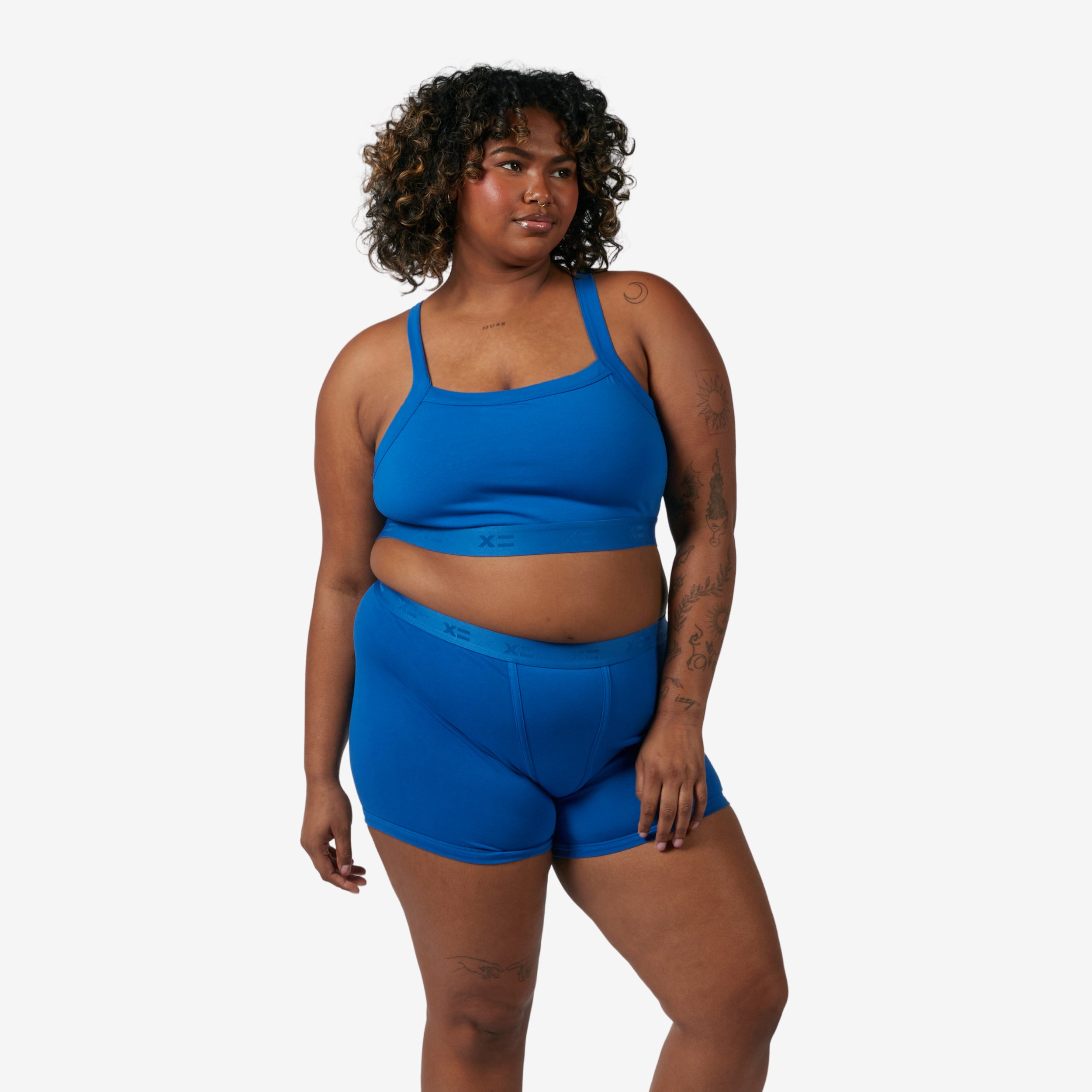 Model: Maliyah is 5'7" and wears a 2X