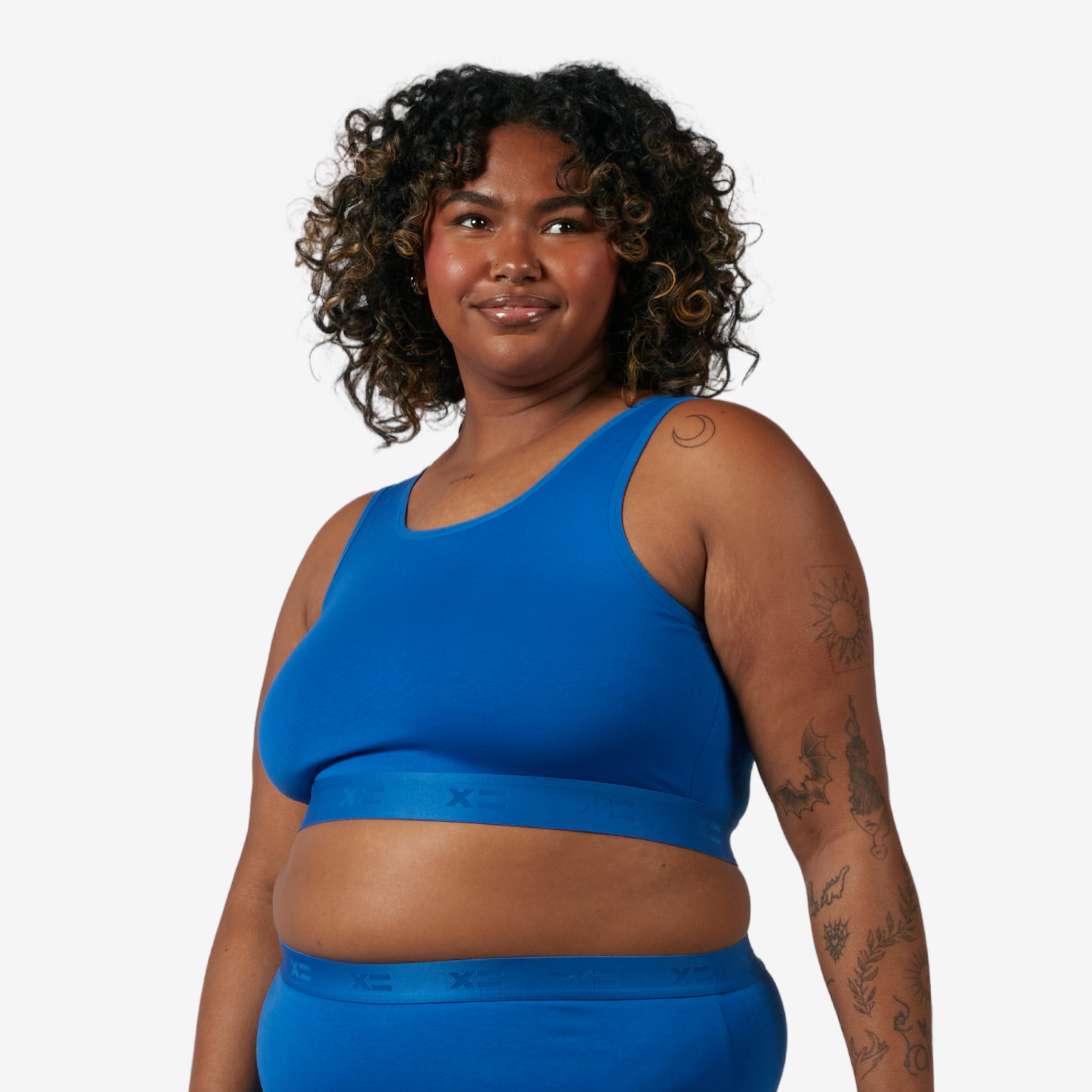 Model: Maliyah is 5'7" and wears a 2X