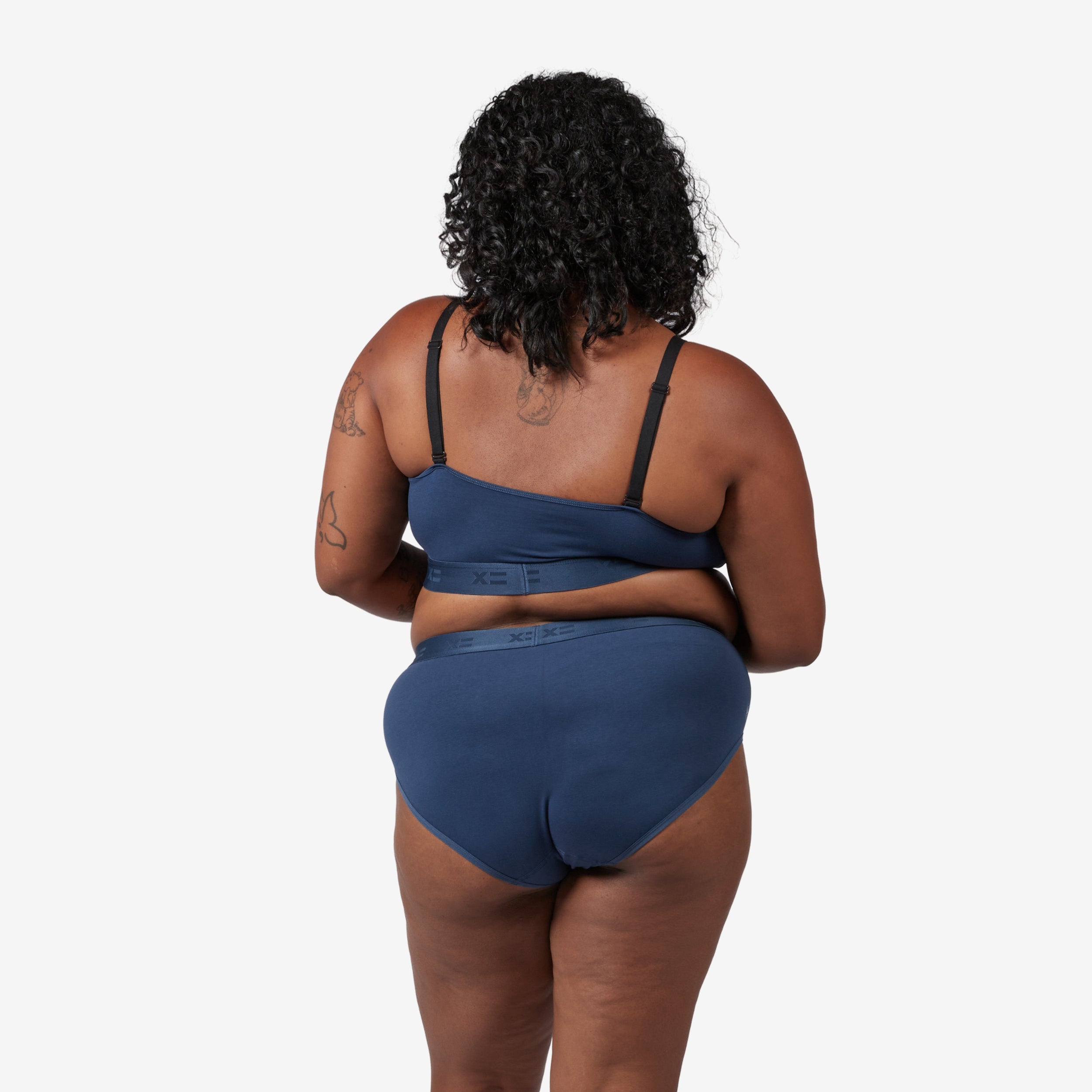 Model: Maliyah is 5'7" and wears a 2X