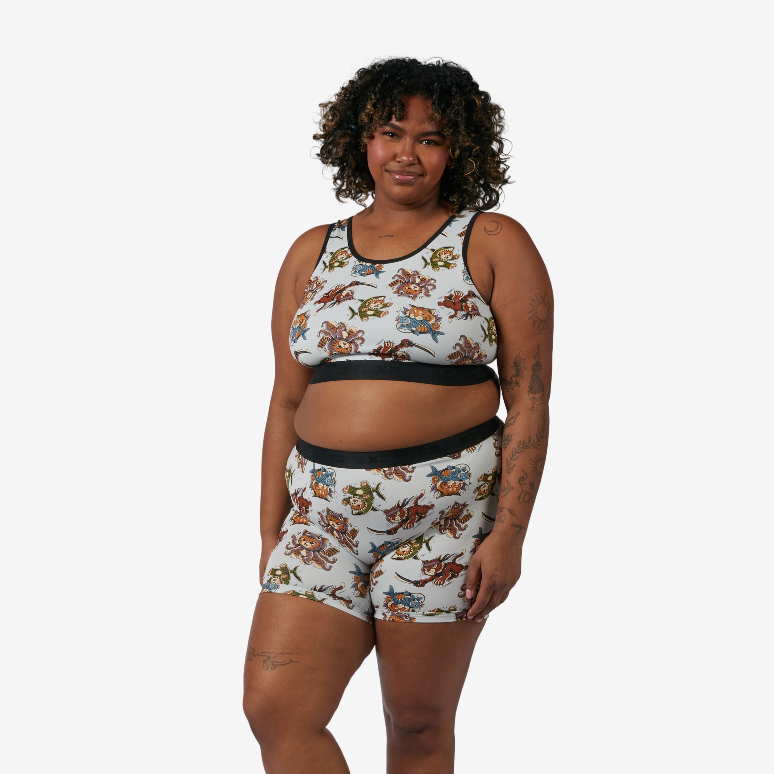 Model: Maliyah is 5'7" and wears a 2X