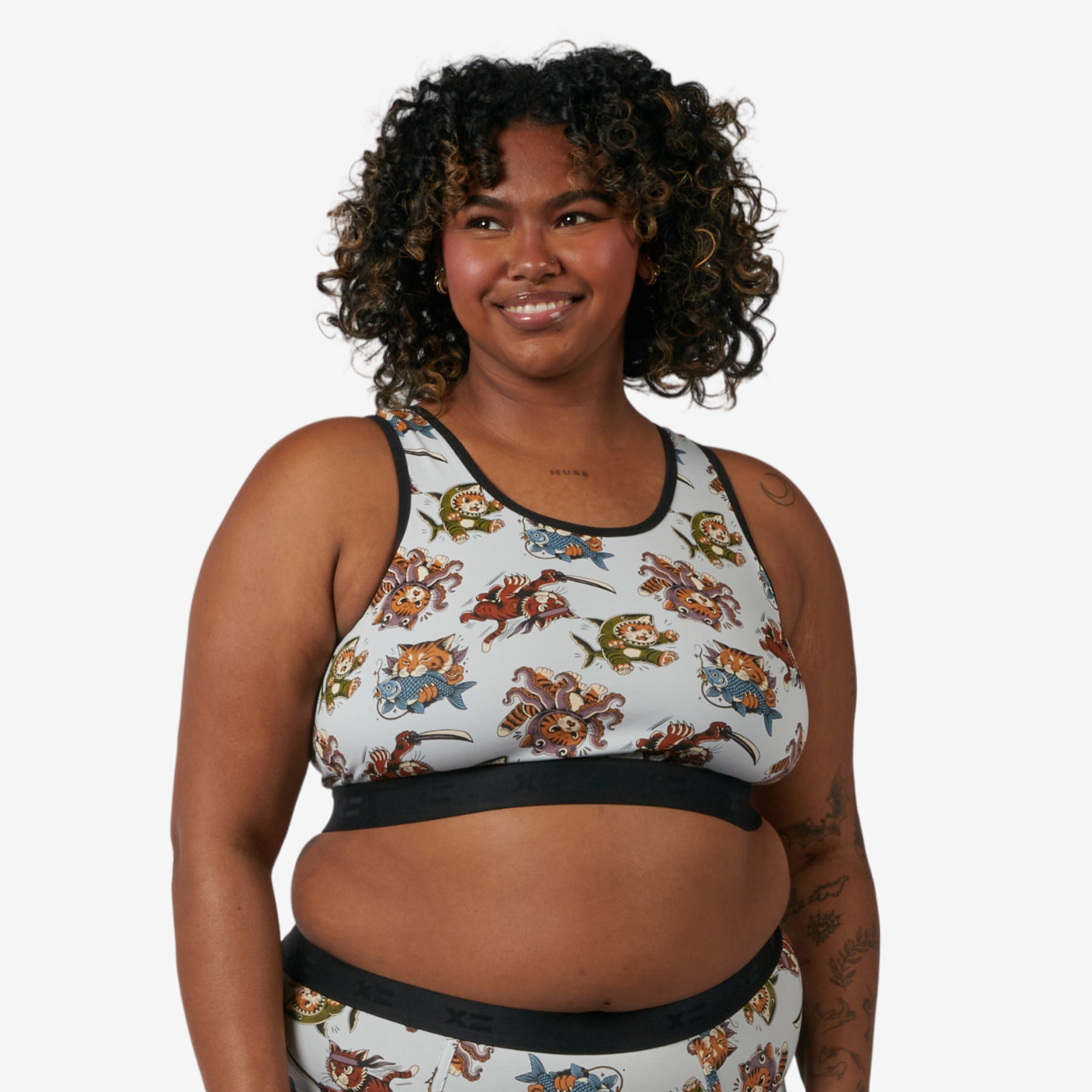 Model: Maliyah is 5'7" and wears a 2X