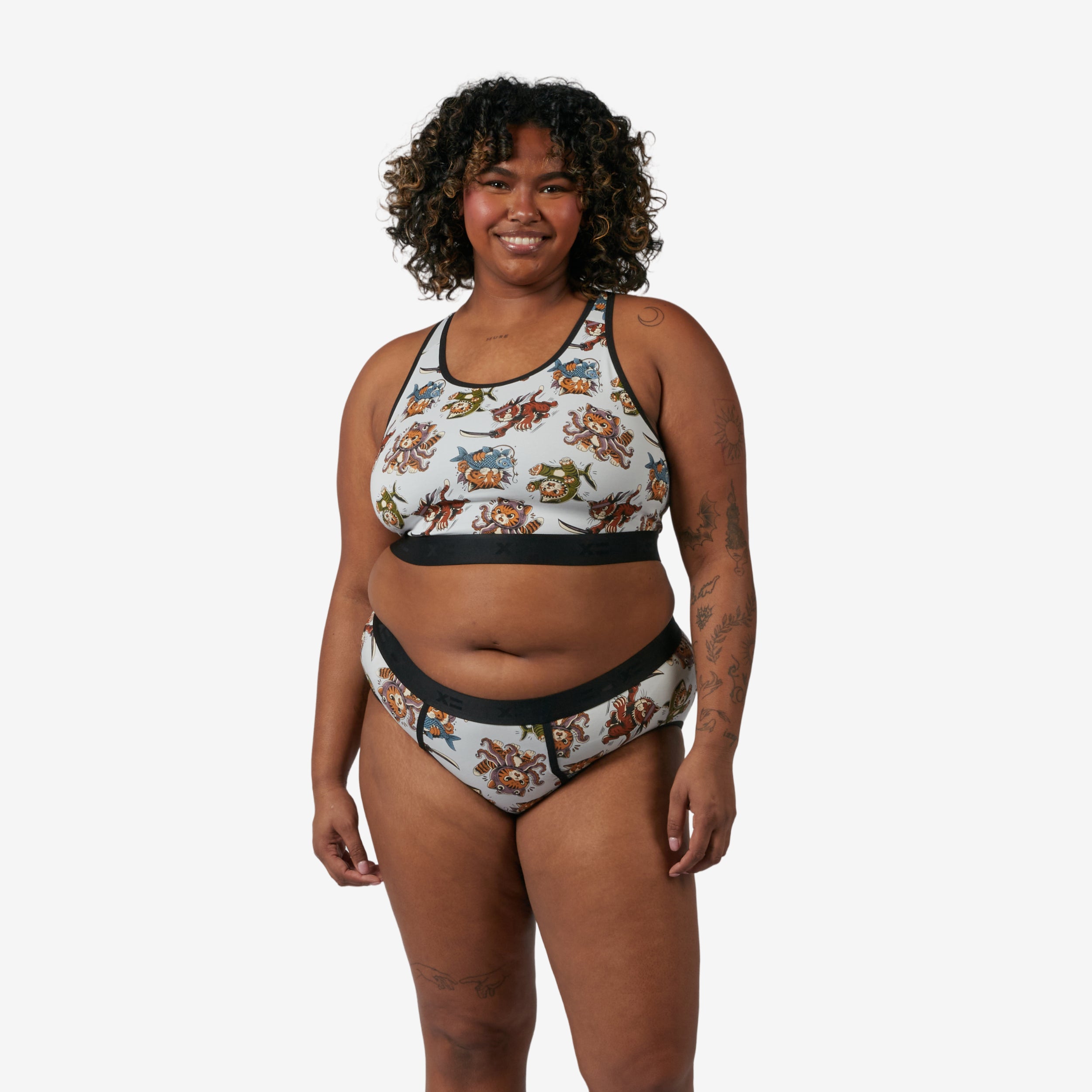 Model: Maliyah is 5'7" and wears a 2X