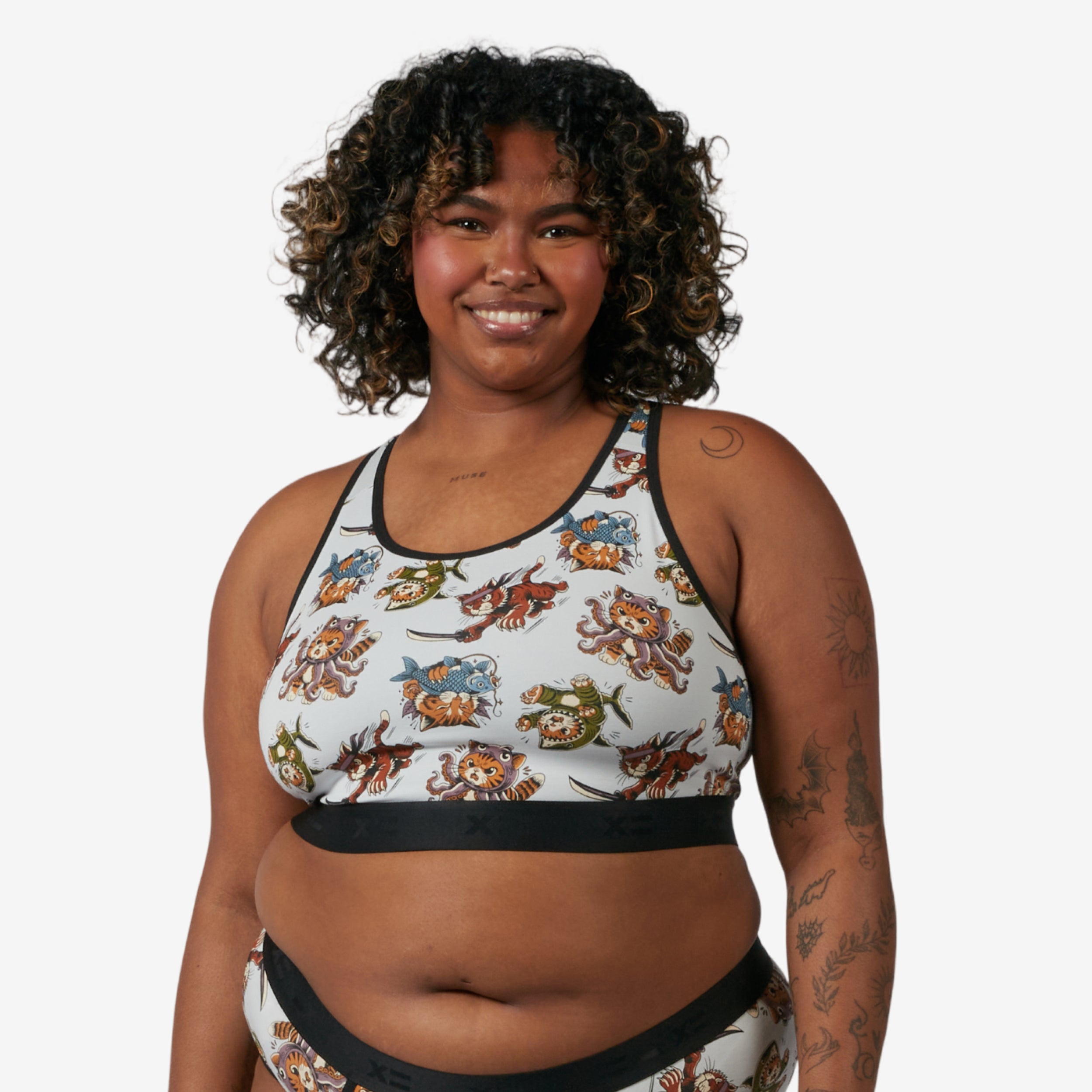 Model: Maliyah is 5'7" and wears a 2X