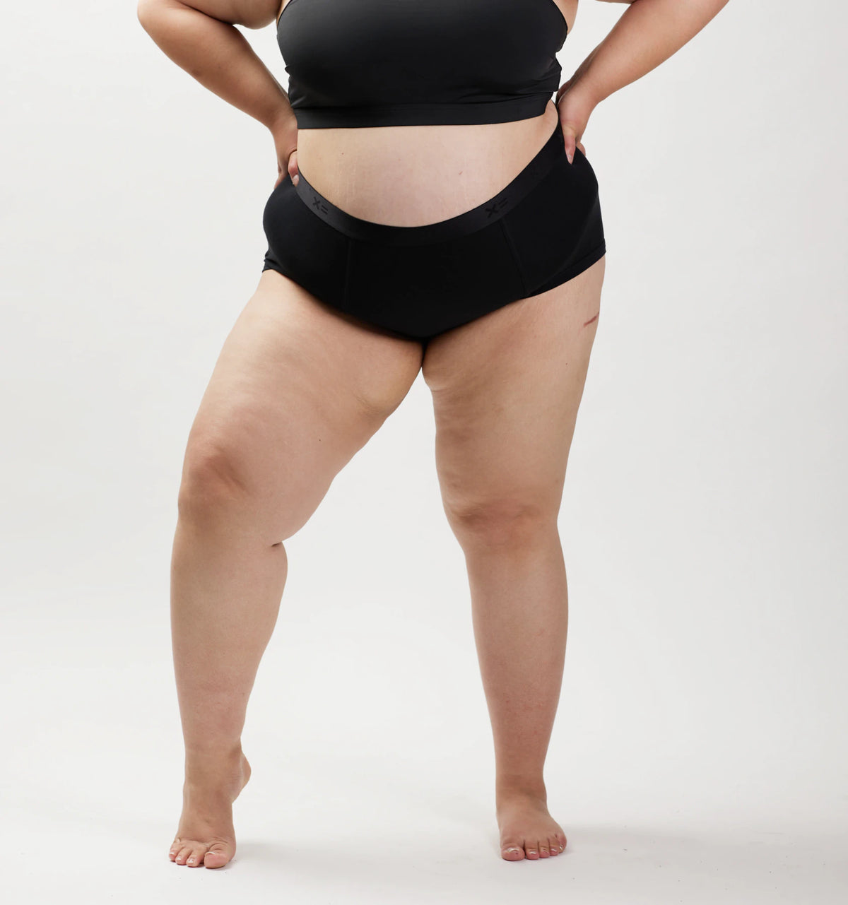 Model: Vanessa is 5'7" and wears a 2x